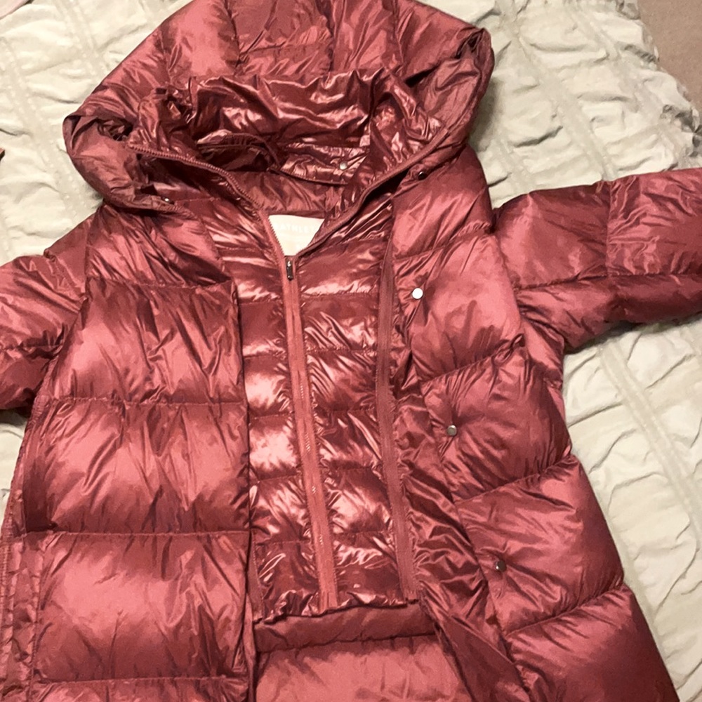 Athlete jacket with removable vest piece